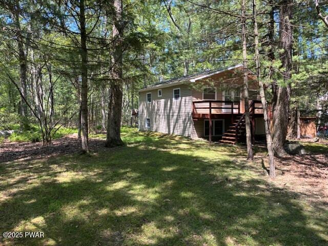 195 Conashaugh Trl, Milford, PA 18337 - view of grassy yard with stairs and a deck