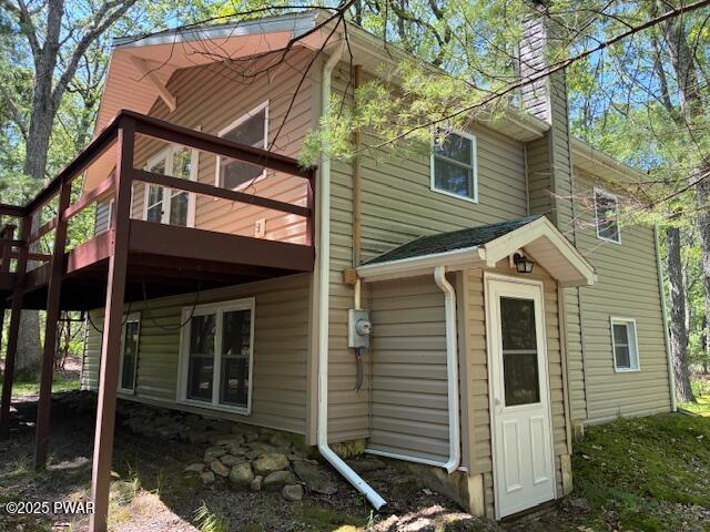 195 Conashaugh Trl, Milford, PA 18337 - back of house featuring a chimney and a deck