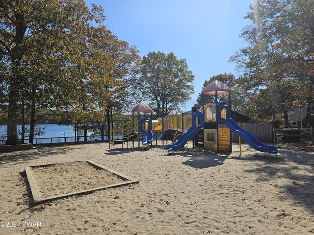 view of playground featuring a water view