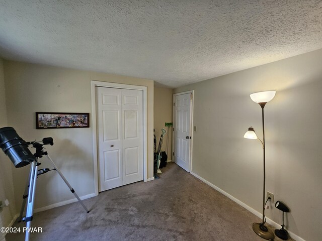 interior space with a textured ceiling