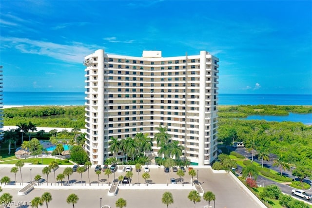 view of building exterior with a water view