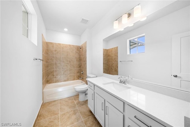 bathroom with visible vents, toilet, shower / washtub combination, tile patterned flooring, and vanity