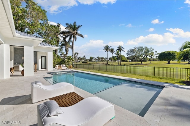 view of pool with a fenced in pool, a fenced backyard, a yard, and a patio