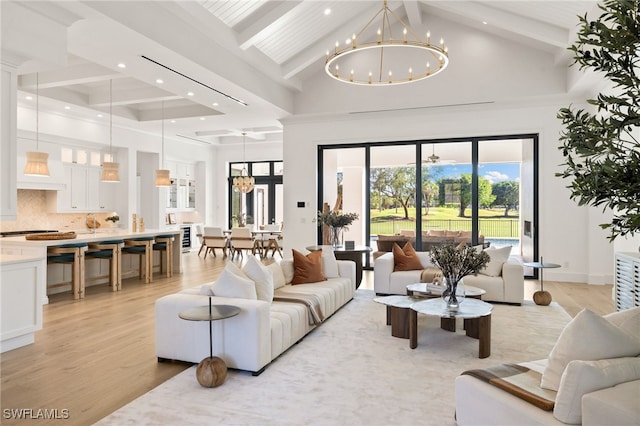 living room featuring a chandelier, high vaulted ceiling, recessed lighting, light wood-style floors, and beamed ceiling