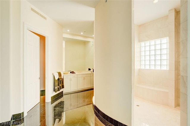 full bath featuring recessed lighting, visible vents, vanity, and tile patterned floors