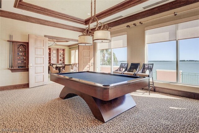 recreation room featuring a water view, carpet, ornamental molding, and billiards