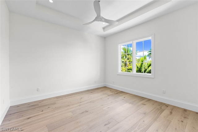 unfurnished room featuring ceiling fan and light wood-type flooring