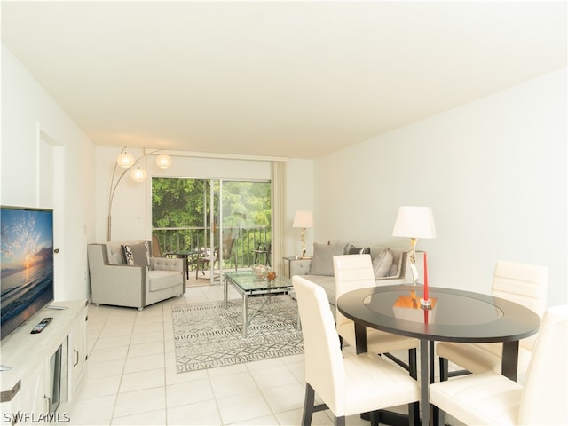 dining space with light tile patterned floors