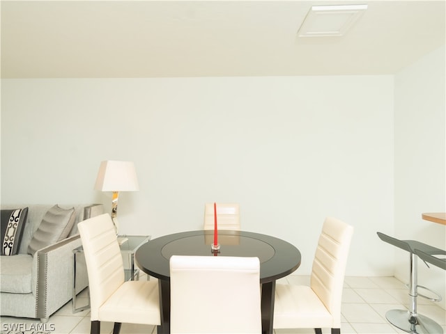 view of tiled dining space