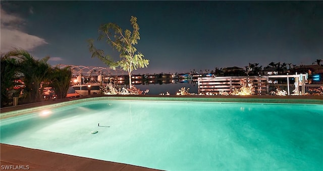 pool at twilight with a water view