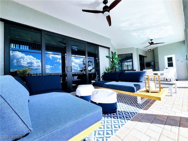 view of patio featuring outdoor lounge area, french doors, and ceiling fan