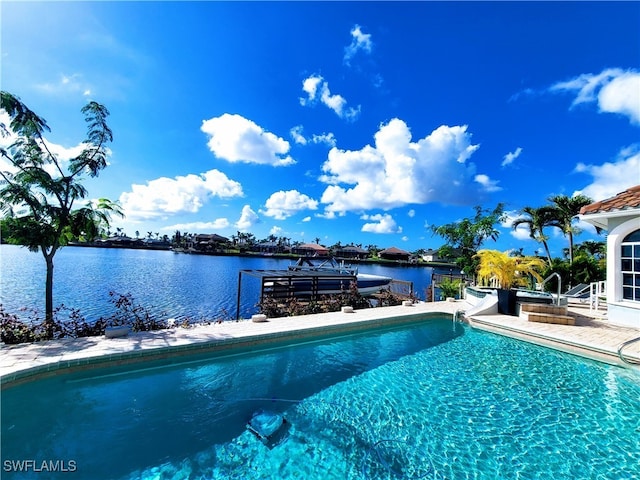 view of pool featuring a water view and a water slide