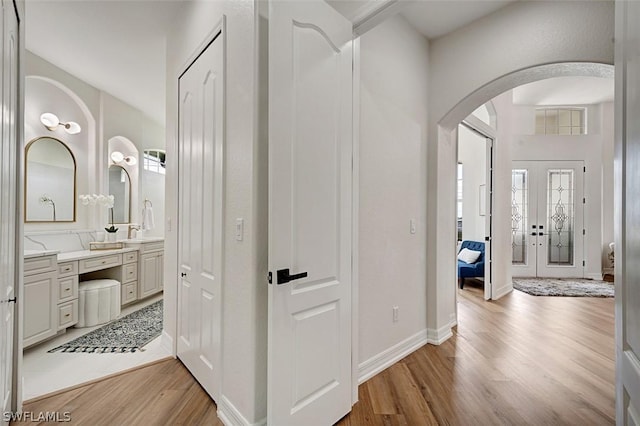 hallway featuring light wood-type flooring