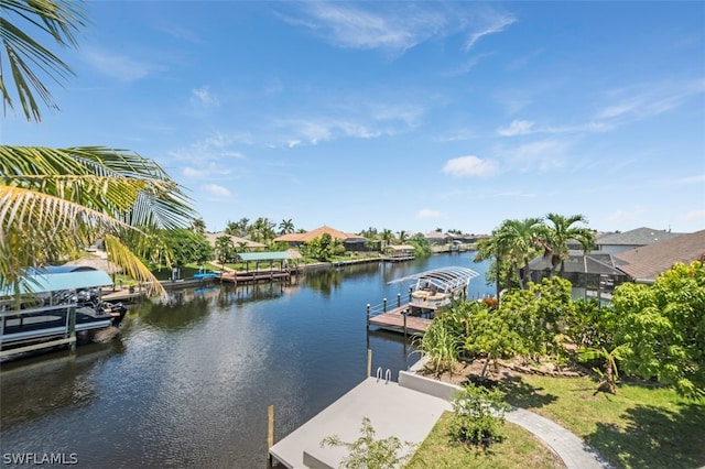 dock area featuring a lanai and a water view