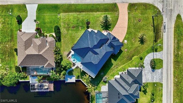 drone / aerial view featuring a water view