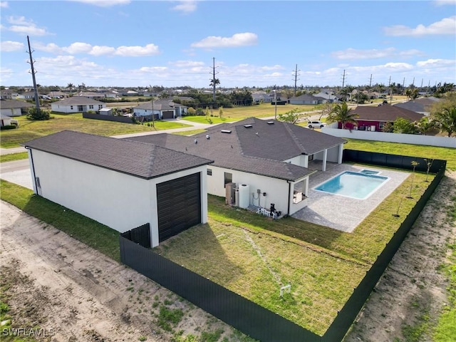 birds eye view of property with a residential view