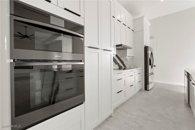 302 El Dorado Blvd N, Cape Coral, FL 33993 - kitchen featuring white cabinetry, light countertops, under cabinet range hood, baseboards, and black appliances