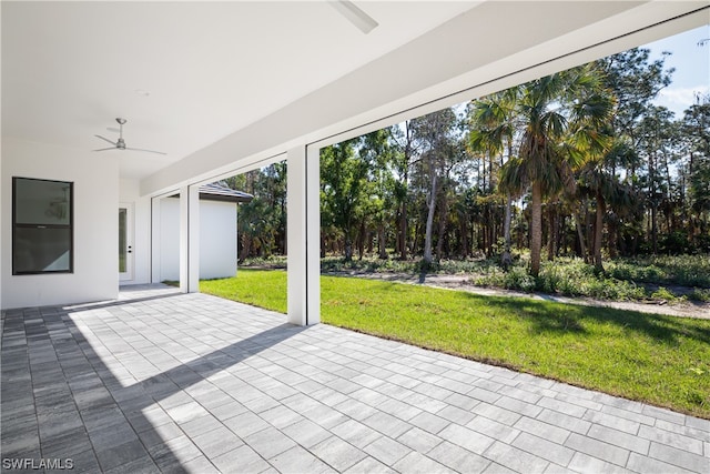 view of patio with ceiling fan