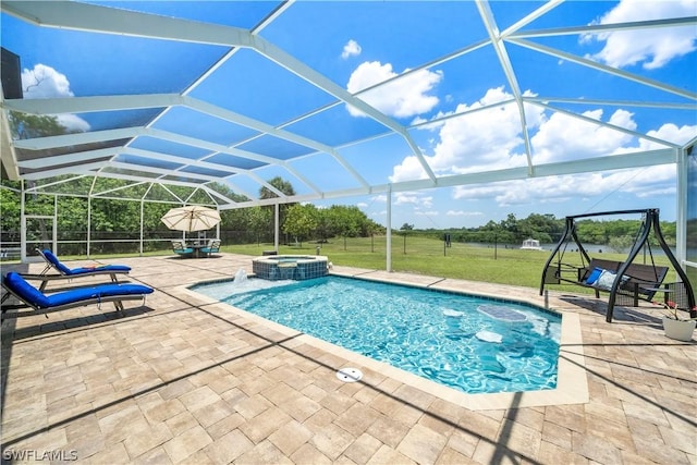 view of swimming pool featuring an in ground hot tub, a lanai, a yard, and a patio