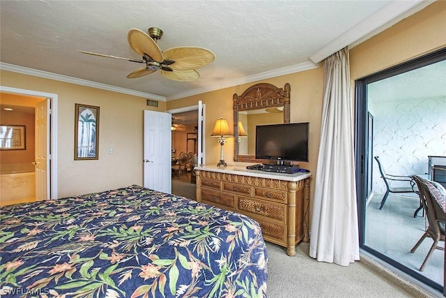 carpeted bedroom featuring ornamental molding, ensuite bath, and ceiling fan