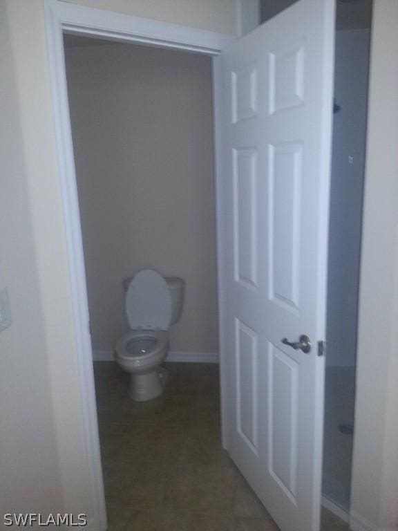 bathroom featuring toilet