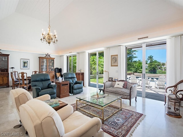 living room featuring a notable chandelier, lofted ceiling, and light tile flooring