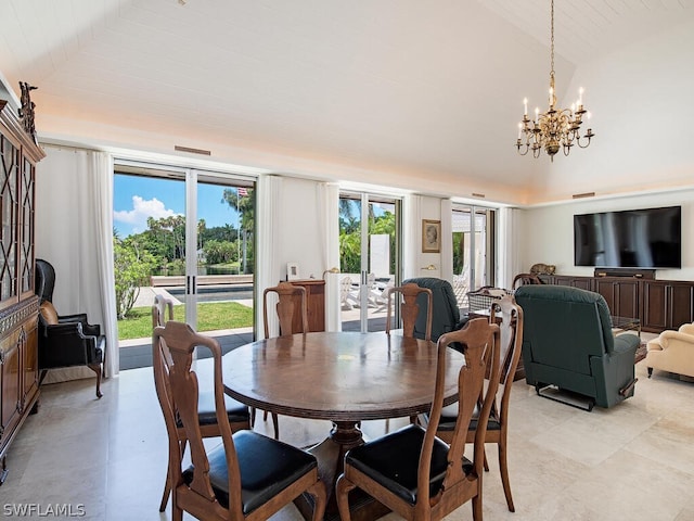 tiled dining room featuring vaulted ceiling and an inviting chandelier