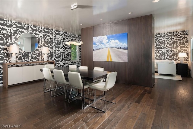 dining room with dark hardwood / wood-style floors