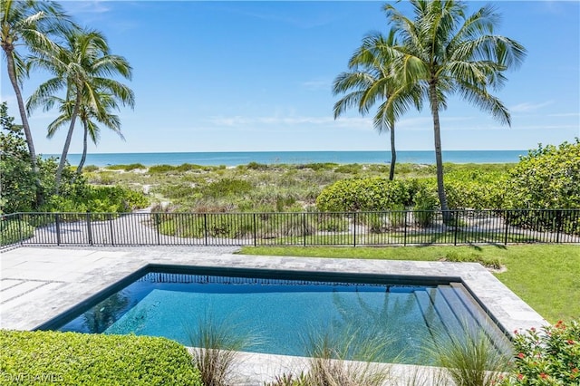 view of pool with a water view