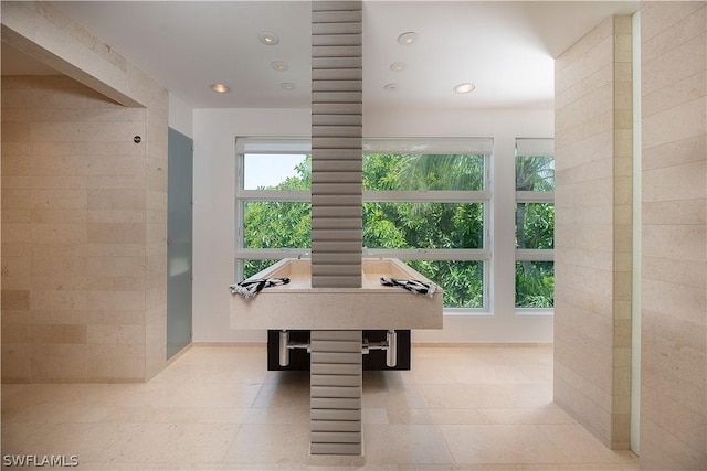 game room featuring light tile floors