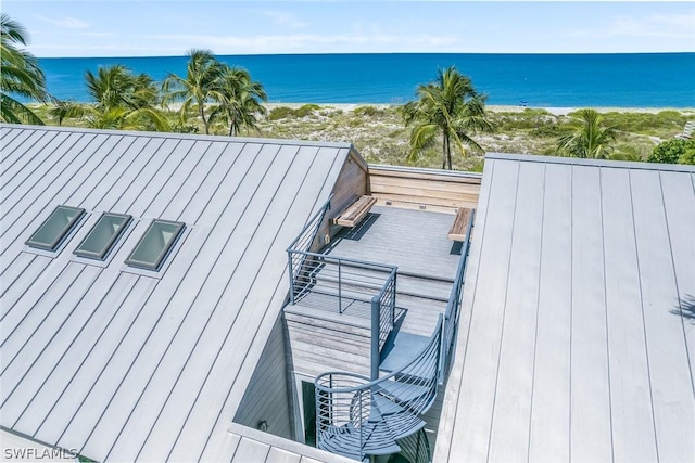 deck featuring a water view