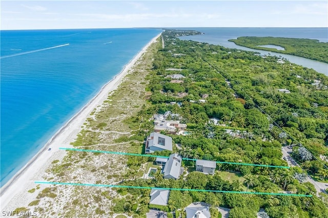 bird's eye view with a water view and a view of the beach