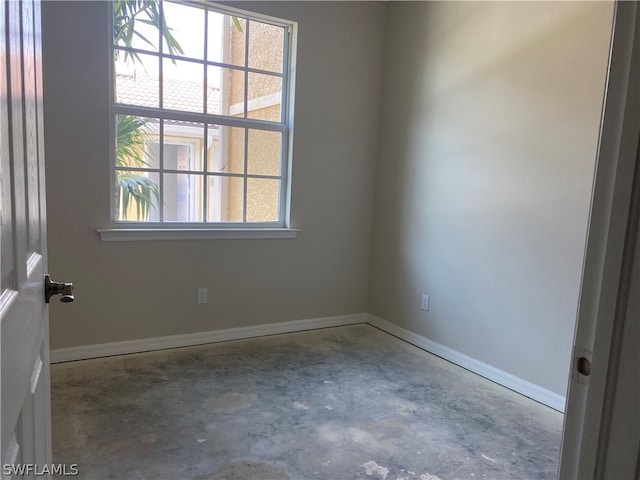 spare room featuring a healthy amount of sunlight