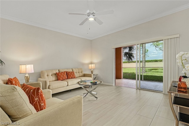 living room with ornamental molding and ceiling fan