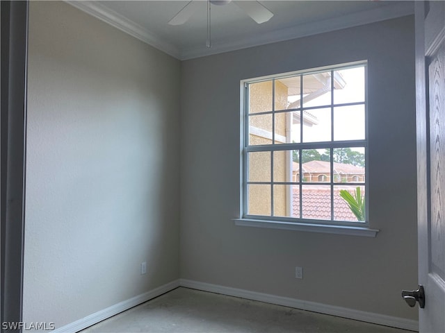 unfurnished room with ornamental molding and ceiling fan