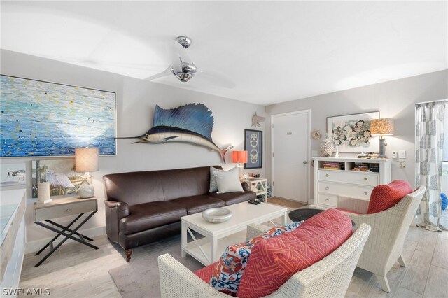 interior space featuring ceiling fan and light wood-type flooring