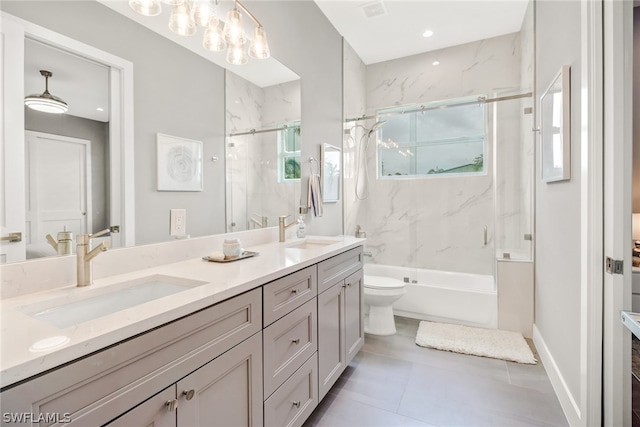 full bathroom with toilet, shower / bath combination with glass door, tile floors, and dual vanity