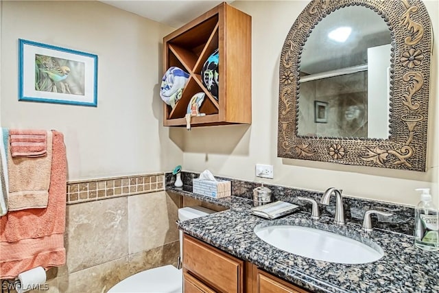 bathroom with oversized vanity and toilet