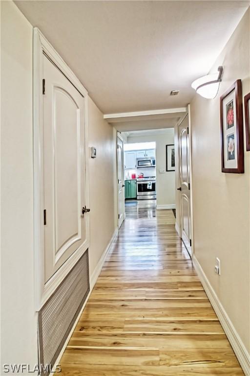 hall featuring light hardwood / wood-style floors