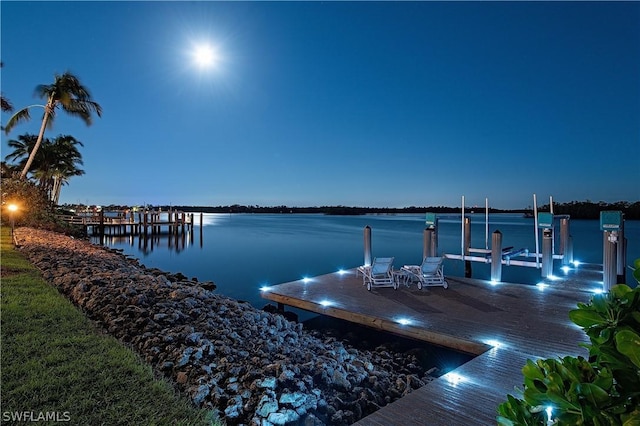 view of dock with a water view