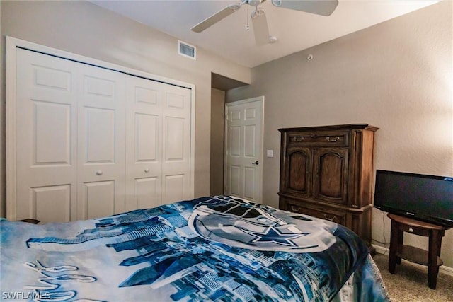 bedroom with a closet, ceiling fan, and carpet