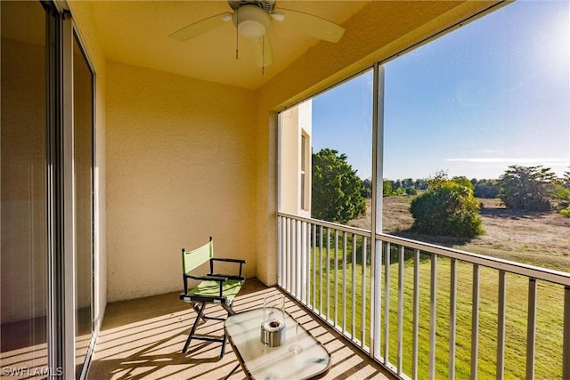 balcony featuring ceiling fan