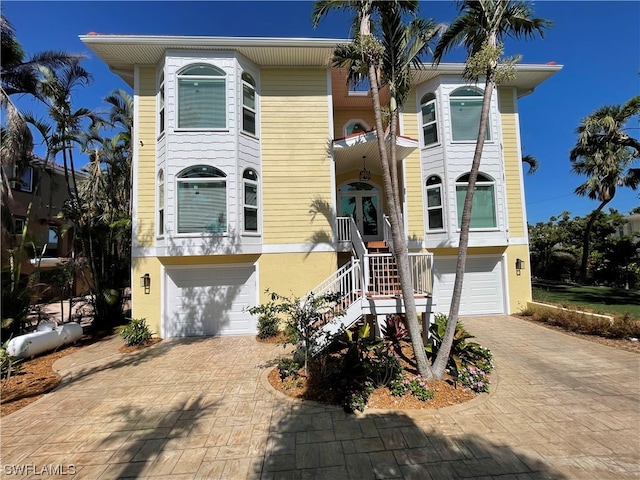 view of front of property with a garage