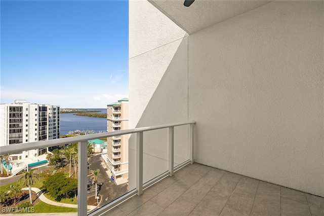 balcony featuring a water view