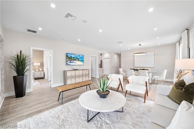 living room featuring light wood-type flooring