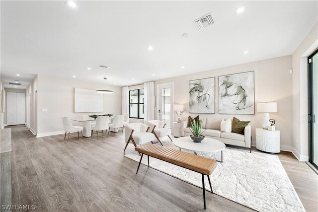 living room featuring light wood-type flooring