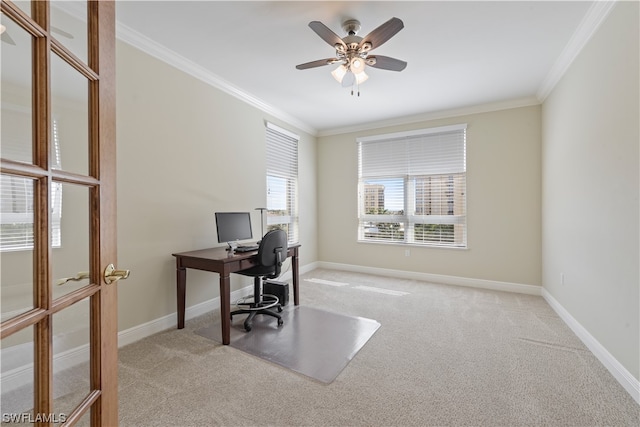 office featuring ceiling fan, light colored carpet, and crown molding