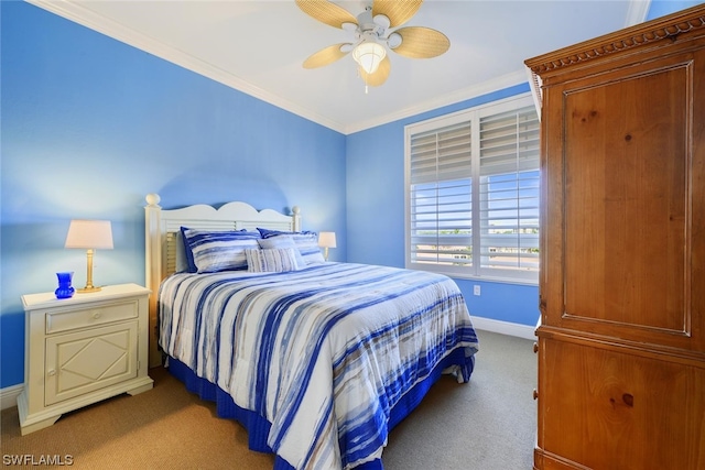 carpeted bedroom featuring ornamental molding and ceiling fan