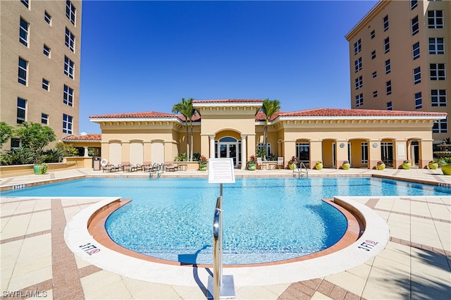 view of pool featuring a patio area