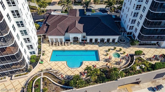 view of pool featuring a patio area